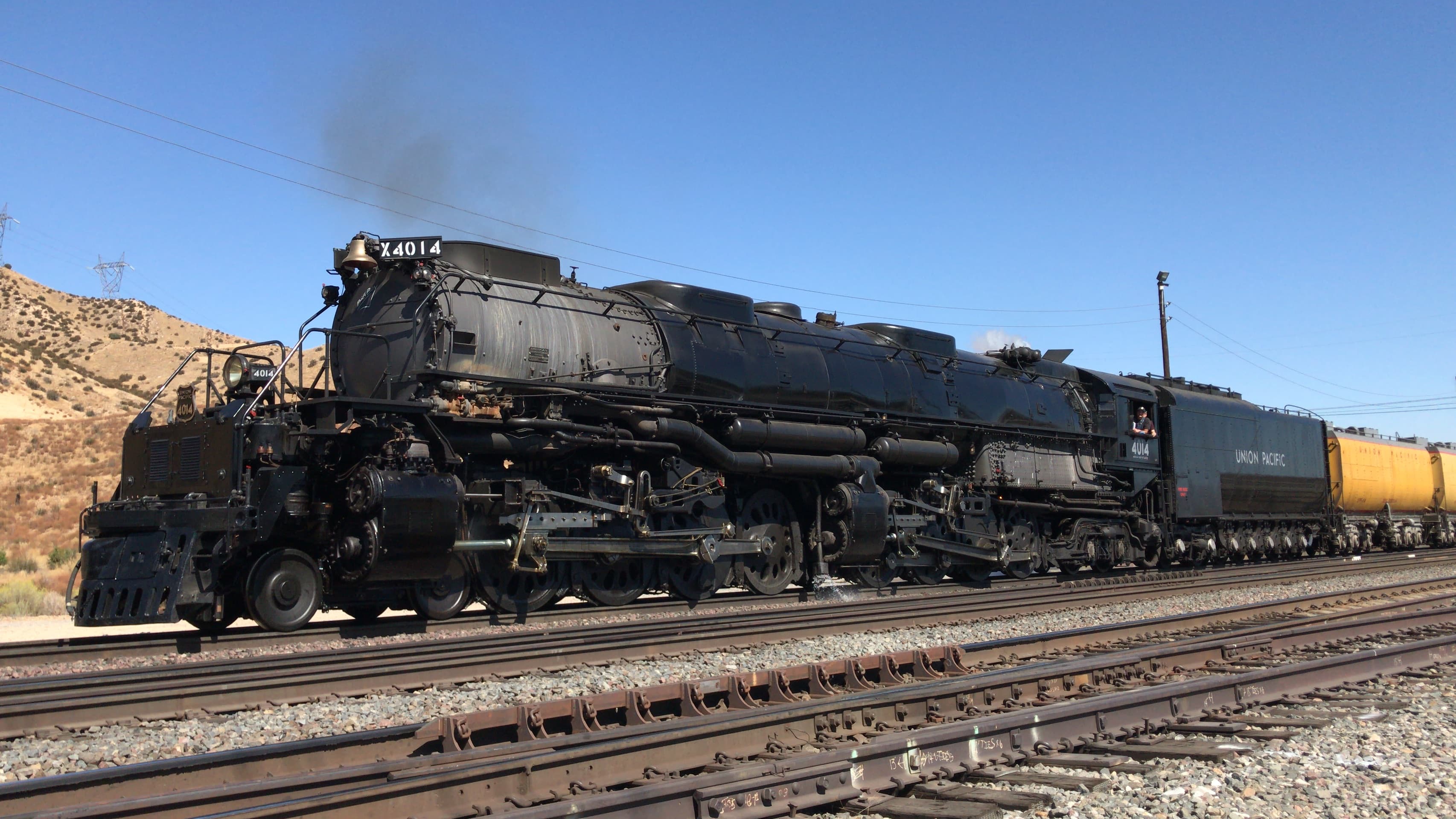 Historical photograph, 2019: Union Pacific Big Boy 4014 pulling a train over Cajon Summit